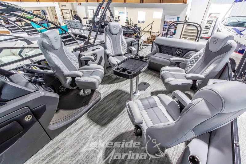 Slide: The Image of Luxurious interior of 2026 Godfrey Monaco 235 QSB pontoon boat with plush seating. - 26