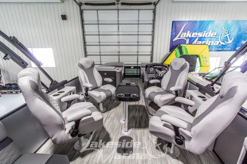 Slide: The Image of Luxurious interior of 2026 Godfrey Monaco 235 QSB pontoon boat with plush seating. - 28