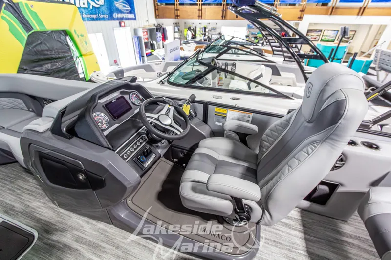 Slide: The Image of 2026 Godfrey Monaco 235 QSB boat interior with modern helm and luxurious seating. - 33