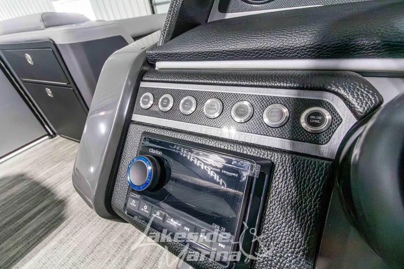 Slide: The Image of Dashboard of 2026 Godfrey Monaco 235 QSB boat with control panel and audio system. - 36