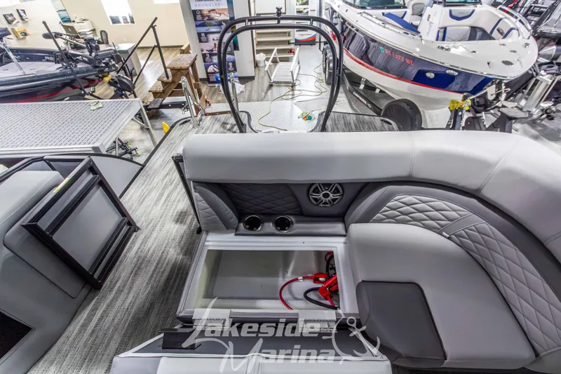 Slide: The Image of 2026 Godfrey Monaco 235 QSB boat interior with luxurious seating and storage at Lakeside Marina. - 42