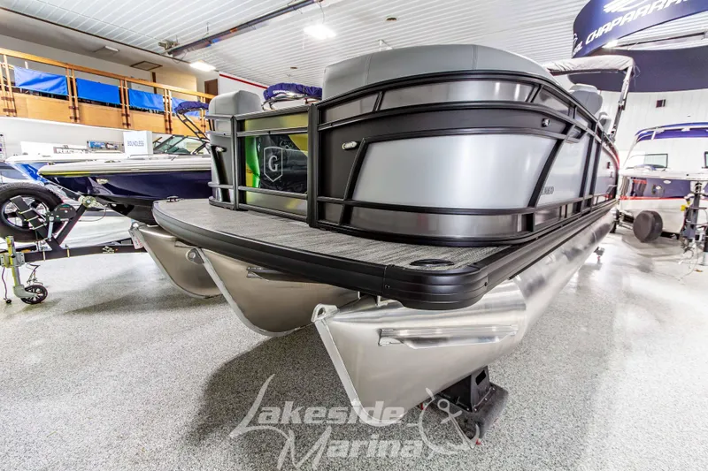 Slide: The Image of 2026 Godfrey Monaco 235 QSB pontoon boat displayed at Lakeside Marina showroom. - 9