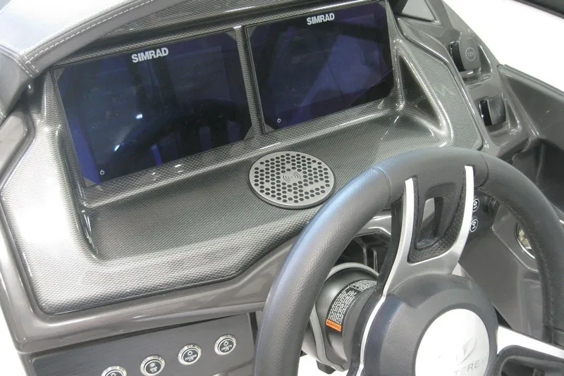 Slide: The Image of 2025 Monterey 238SS Super Sport dashboard with steering wheel and control panel. - 11