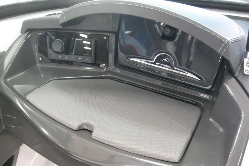 Slide: The Image of Dashboard of 2025 Monterey 238SS Super Sport with dual Simrad displays and steering wheel. - 12