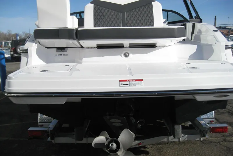 Slide: The Image of 2025 Monterey 238SS Super Sport boat rear view with swim platform and propeller. - 4