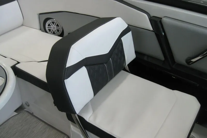 Slide: The Image of 2025 Monterey 238SS Super Sport boat interior with cushioned seating and round table. - 8