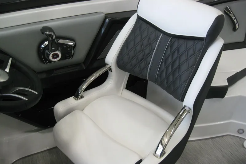 Slide: The Image of 2025 Monterey 238SS Super Sport boat interior with stylish seating and speaker detail. - 9
