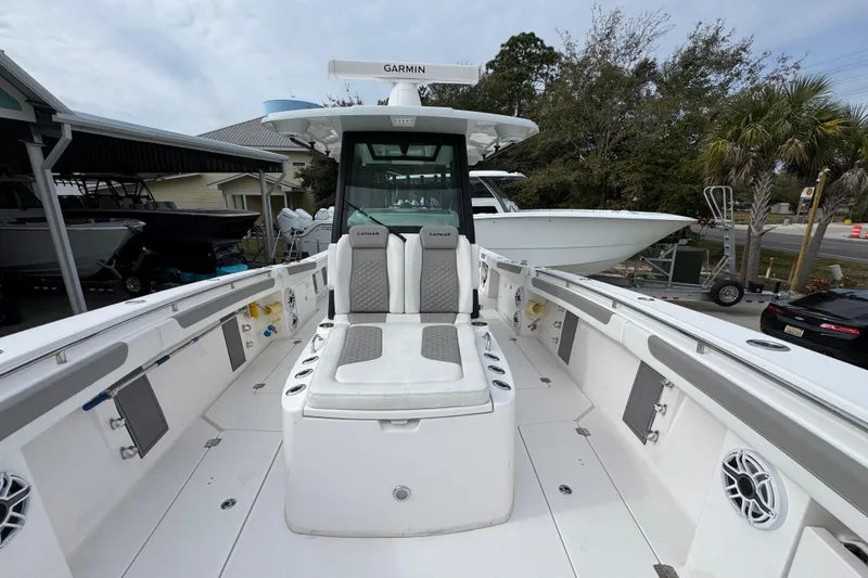 Slide: The Image of 2024 Caymas 34 CT boat interior with seating and modern design features. - 21