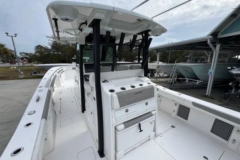Slide: The Image of 2024 Caymas 34 CT boat interior with modern helm and seating. - 36