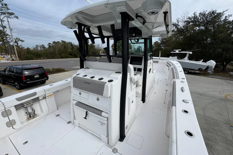 Slide: The Image of 2024 Caymas 34 CT boat with spacious deck and modern console design. - 38