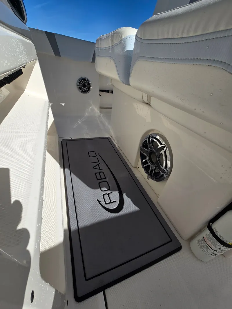 Slide: The Image of Interior of 2022 Robalo R272 Center Console with speaker and logo. - 19