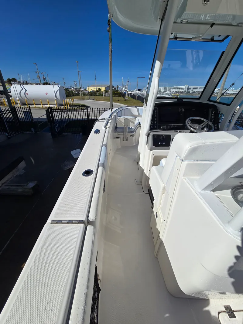 Slide: The Image of Interior view of a 2022 Robalo R272 Center Console boat. - 30