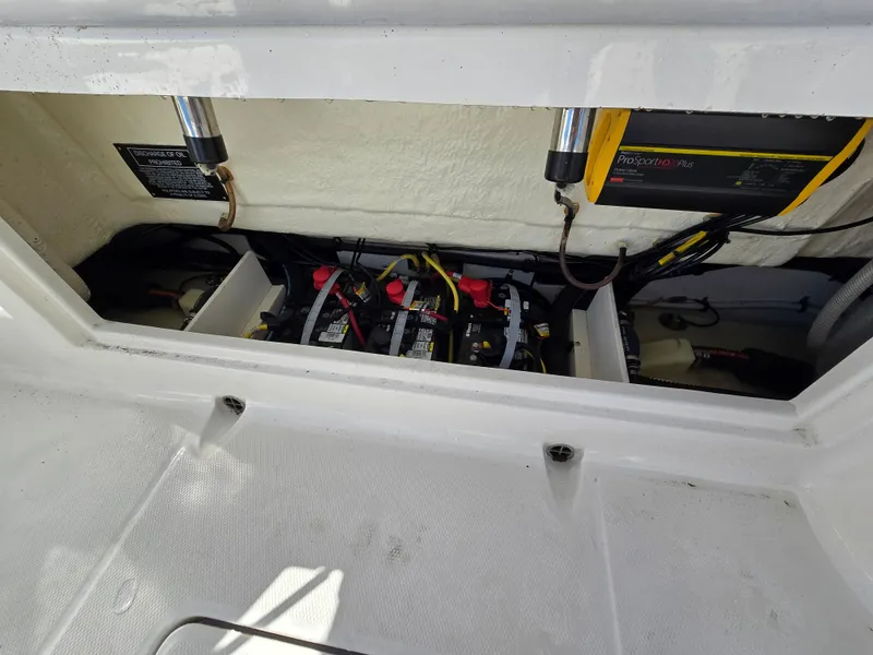 Slide: The Image of Battery compartment of 2022 Robalo R272 Center Console boat. - 34