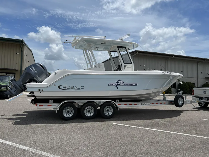 Slide: The Image of 2022 Robalo R272 Center Console on trailer outdoors. - 43