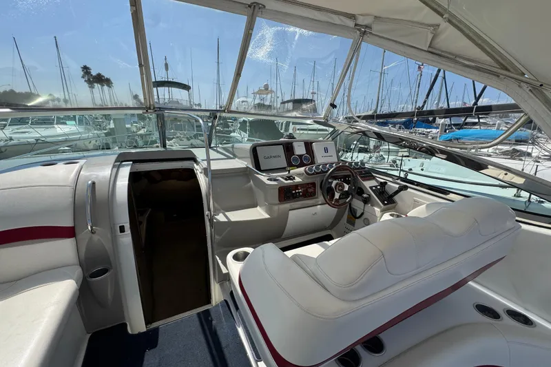 Slide: The Image of 2003 Formula 37 Performance Cruiser cockpit with modern navigation equipment and luxurious seating. - 19