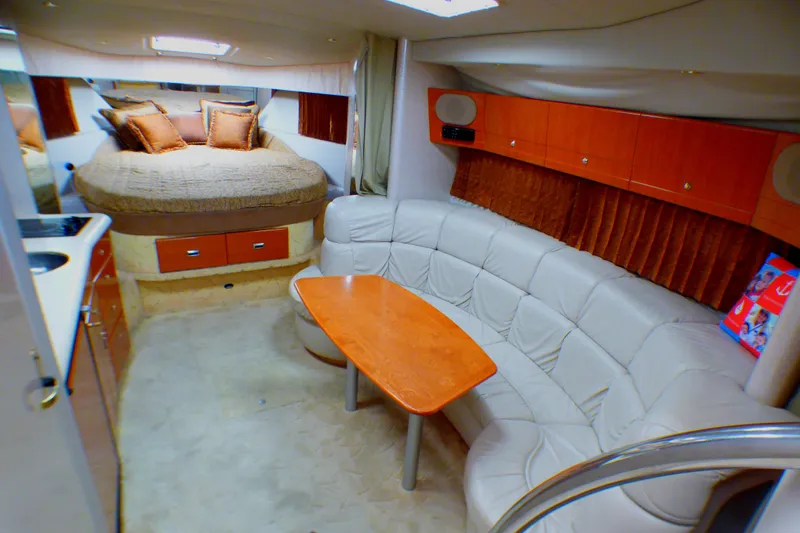 Slide: The Image of Luxurious interior of a 2003 Formula 37 PC yacht with cozy seating and elegant decor. - 21