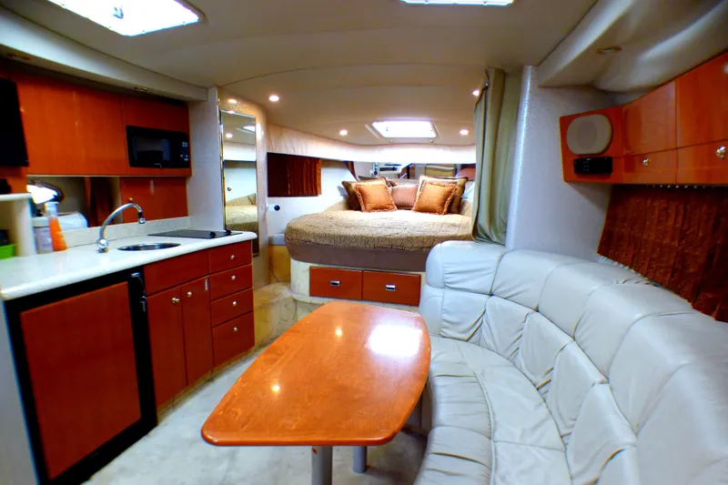 Slide: The Image of Luxurious interior of a 2003 Formula 37 PC yacht with modern amenities and cozy seating. - 22