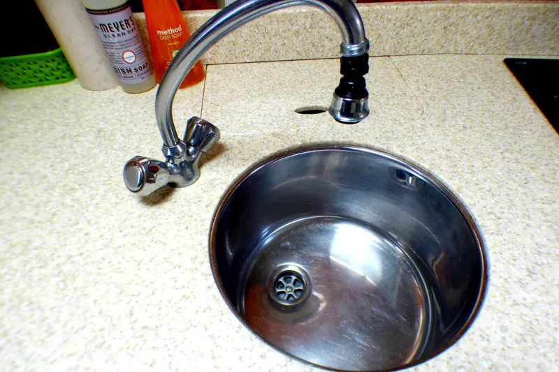 Slide: The Image of Stainless steel sink with faucet on a Formula 37 PC 2003 boat. - 33