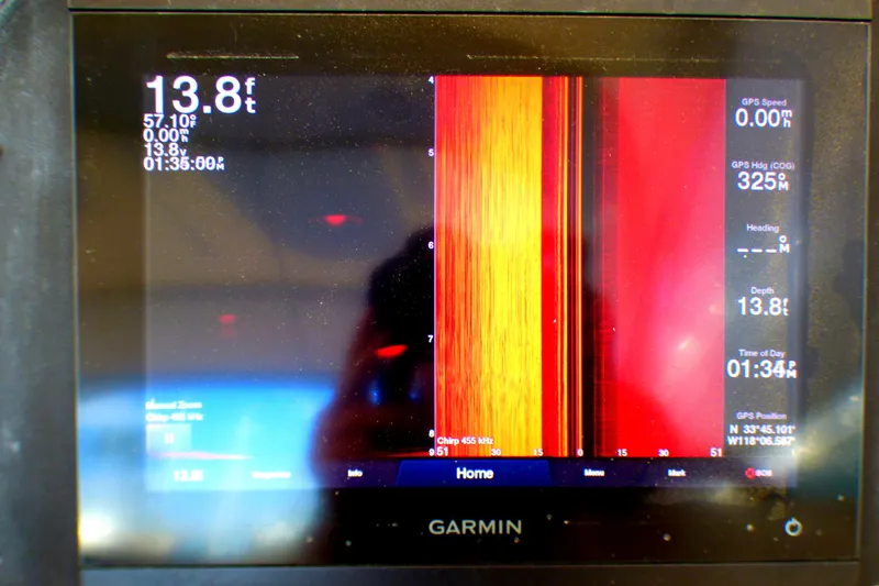 Slide: The Image of Garmin marine display showing depth and navigation data on a 2003 Formula 37 PC boat. - 43
