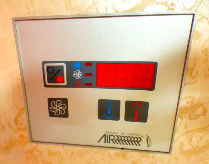 Slide: The Image of Control panel for marine air systems on a 2003 Formula 37 PC boat. - 52