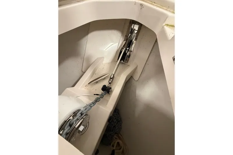Slide: The Image of Anchor chain compartment of 2024 Tiara Yachts 48 LS, showcasing marine equipment. - 10