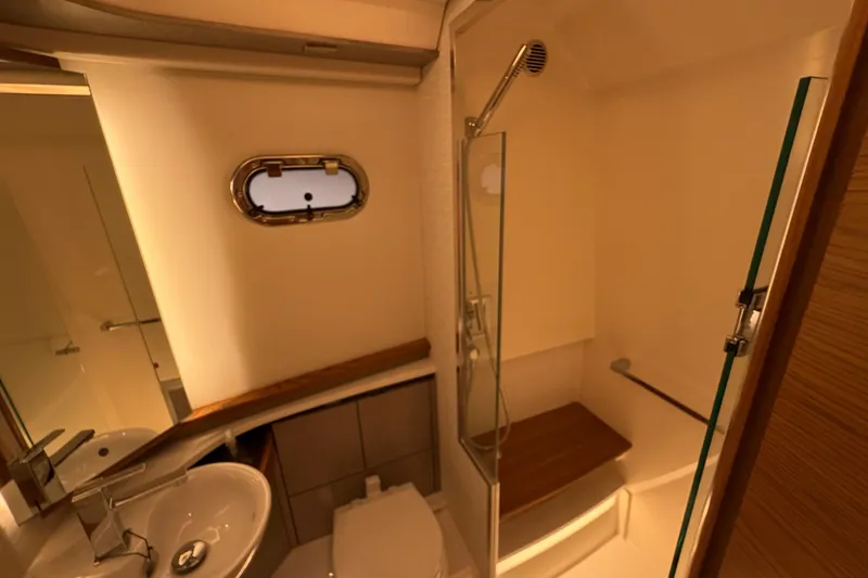 Slide: The Image of Luxurious bathroom in 2024 Tiara Yachts 48 LS, featuring modern fixtures and elegant design. - 26