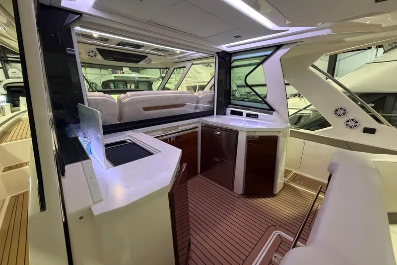 Slide: The Image of Luxurious interior of 2024 Tiara Yachts 48 LS with modern amenities and sleek design. - 34