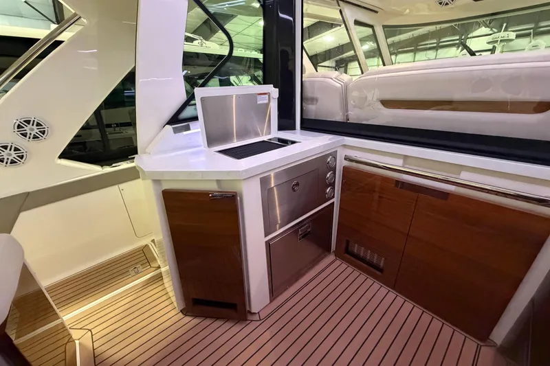 Slide: The Image of 2024 Tiara Yachts 48 LS interior with sleek kitchen and modern design. - 36