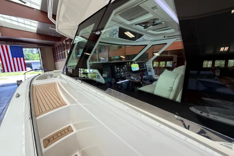 Slide: The Image of 2024 Tiara Yachts 48 LS interior view with sleek design and advanced controls. - 33