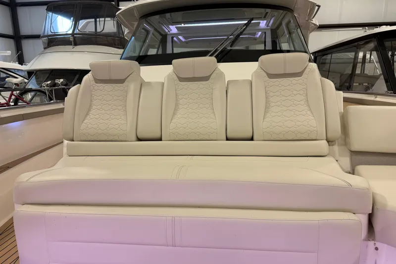 Slide: The Image of Luxurious seating on 2024 Tiara Yachts 48 LS, featuring elegant design and comfort. - 7