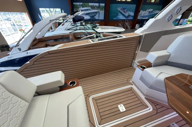 Slide: The Image of 2024 Tiara Yachts 48 LS interior with luxurious seating and elegant wood finish. - 43