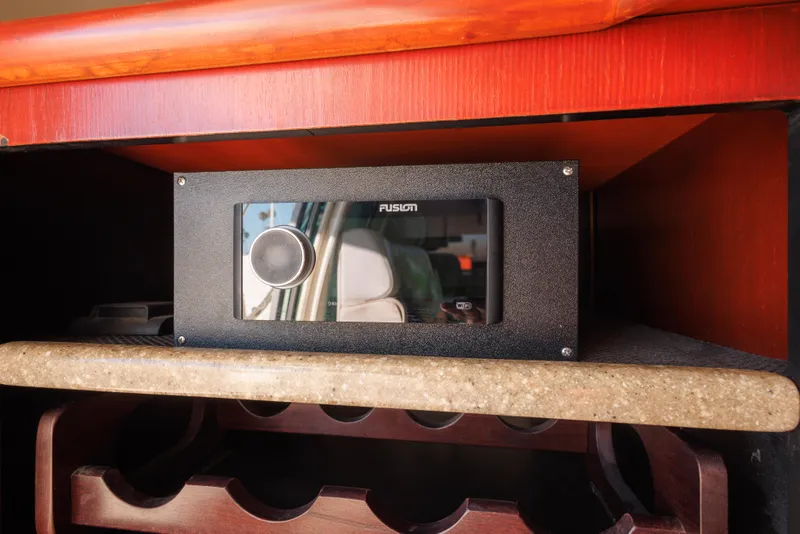 Slide: The Image of Fusion audio system in a 1997 Maxum 4600 SCB yacht interior. - 13