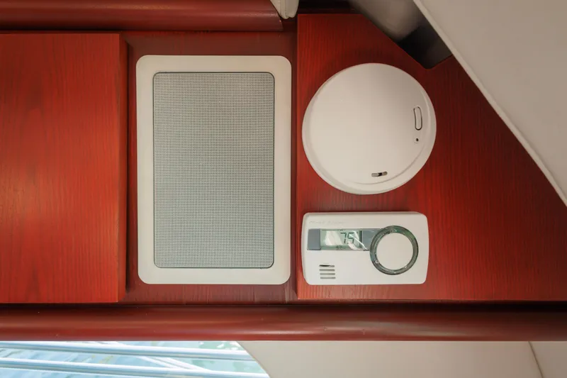 Slide: The Image of Interior of 1997 Maxum 4600 SCB yacht with speaker, smoke detector, and thermostat. - 14