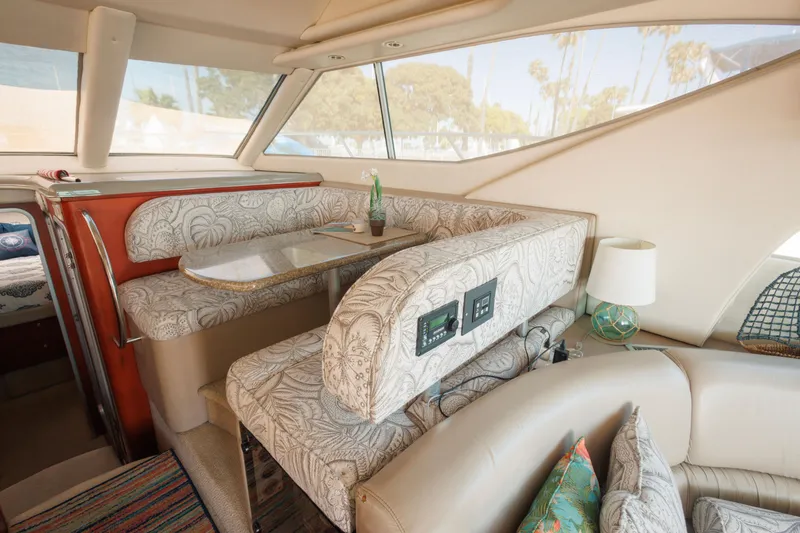 Slide: The Image of Interior of 1997 Maxum 4600 SCB yacht with elegant seating and modern decor. - 16