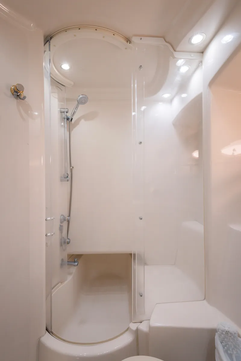 Slide: The Image of Luxurious shower in 1997 Maxum 4600 SCB yacht, featuring sleek design and modern fixtures. - 39