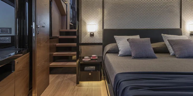 Slide: The Image of Luxurious bedroom interior of 2025 Absolute NAVETTA 75 yacht with modern design and cozy ambiance. - 28