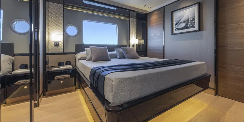 Slide: The Image of Luxurious bedroom interior of 2025 Absolute NAVETTA 75 yacht with modern design and elegant decor. - 32