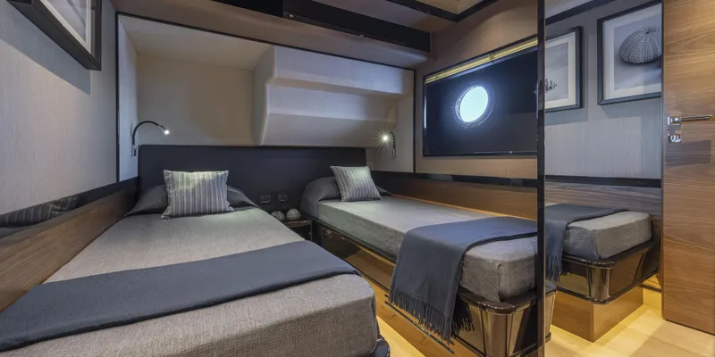 Slide: The Image of Luxurious twin cabin interior of 2025 Absolute NAVETTA 75 yacht. - 34