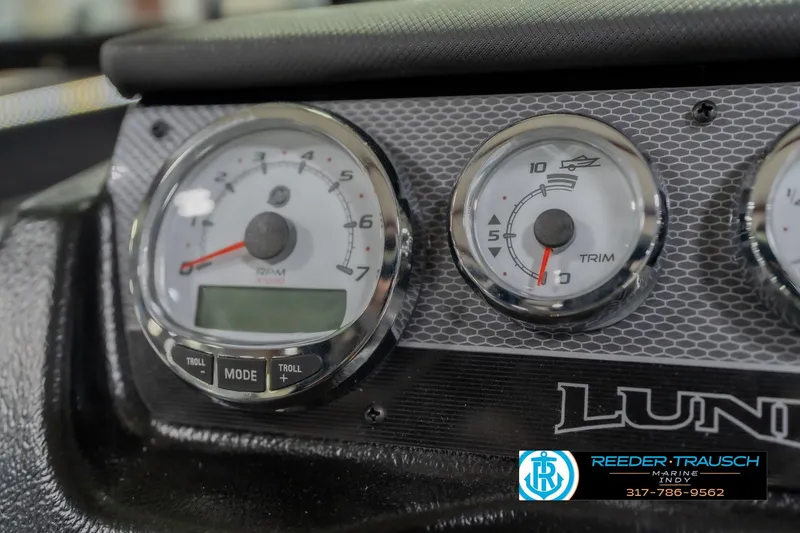 Slide: The Image of Dashboard of 2026 Lund 1975 Pro-V Sport boat with gauges and controls. - 38