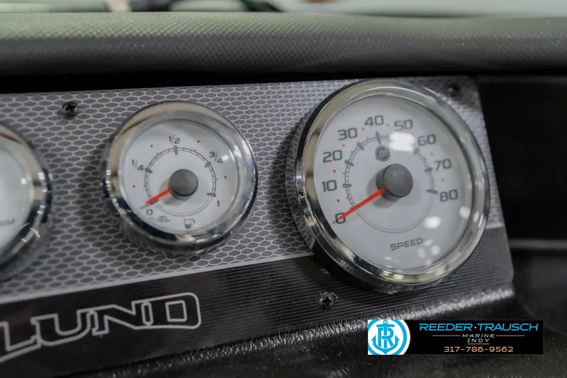Slide: The Image of Dashboard of 2026 Lund 1975 Pro-V Sport with speedometer and fuel gauge. - 39