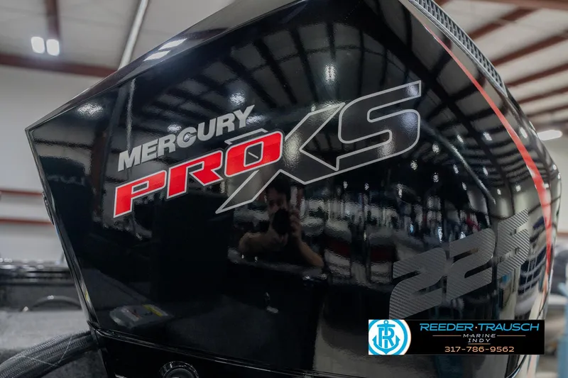 Slide: The Image of Mercury Pro XS engine on 2026 Lund 1975 Pro-V Sport boat, indoor showroom. - 53