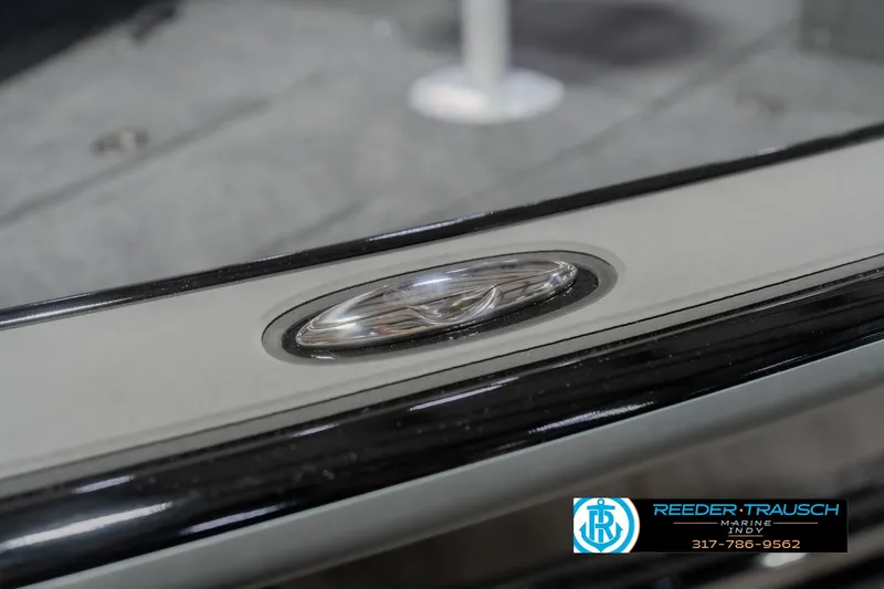 Slide: The Image of Close-up of 2026 Lund 1975 Pro-V Sport boat detail with Reeder-Trausch Marine logo. - 65