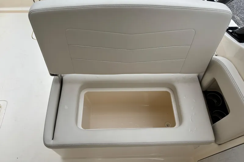 Slide: The Image of 2026 Scout 240 Dorado boat seat with integrated storage compartment. - 25