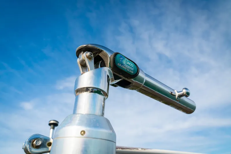 Slide: The Image of Close-up of a Taco Marine Grand Slam outrigger on a 2005 Sea Hunt Triton 232 boat. - 22