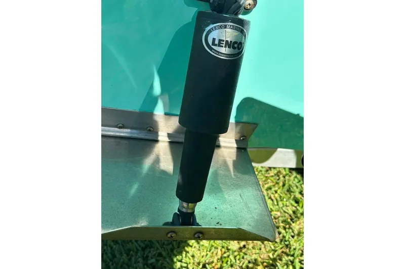 Slide: The Image of Lenco Marine trim tab on 1998 Sea Strike 18 CC boat. - 16