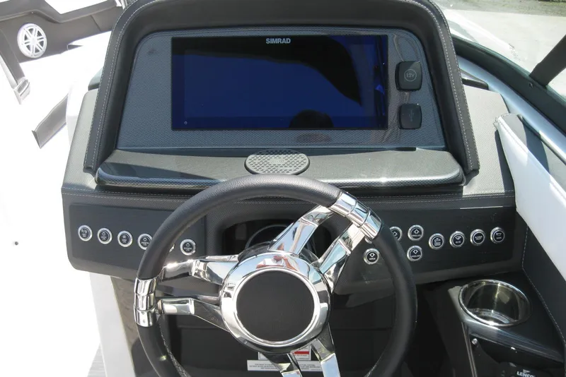 Slide: The Image of 2025 Monterey 278SS Super Sport boat cockpit with modern steering and controls. - 11