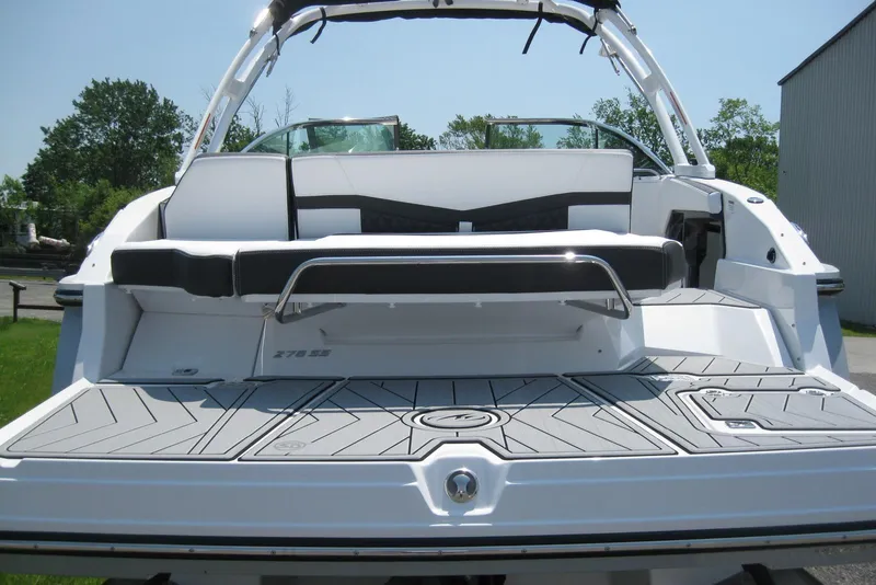 Slide: The Image of 2025 Monterey 278SS Super Sport boat rear view with swim platform and propeller. - 5