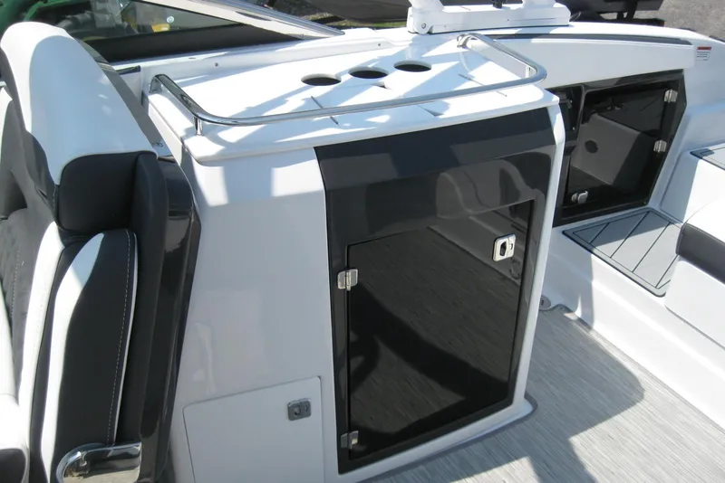 Slide: The Image of 2025 Monterey 278SS Super Sport boat interior with sleek white and black seating. - 9