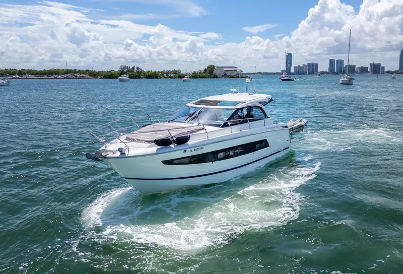 Slide: The Image of 2019 Jeanneau Leader 40 yacht cruising on a sunny day in open waters. - 10