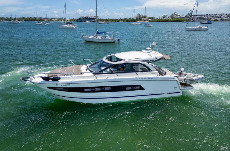 Slide: The Image of 2019 Jeanneau Leader 40 yacht cruising on a sunny day in a scenic bay. - 3